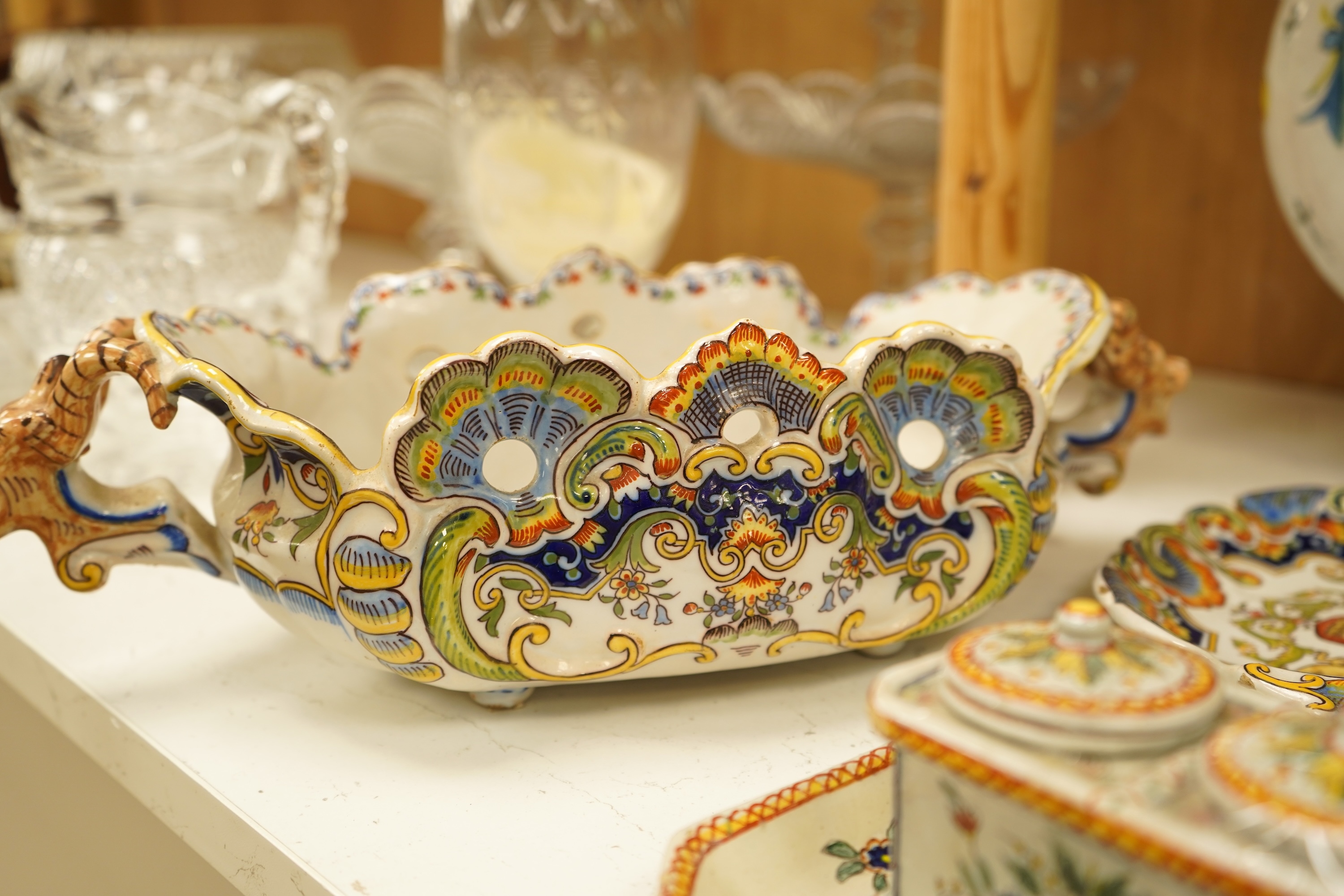 A collection of early 20th century French faience pieces To include dishes, an inkwell and a large ewer, 42cm high